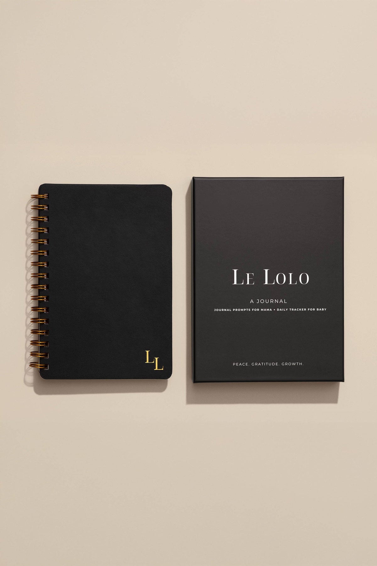 Le Lolo postpartum journal with prompts for mother and daily tracker for baby