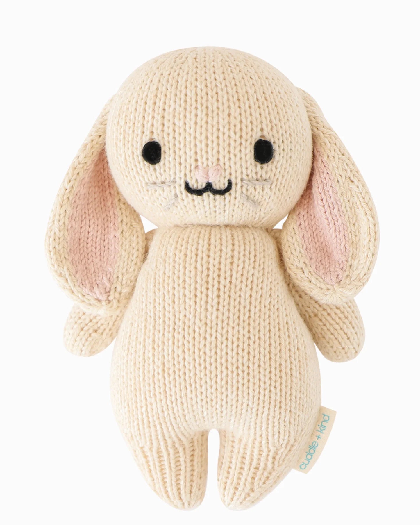 cuddle and kind baby bunny in oatmeal, hand knit in Peru