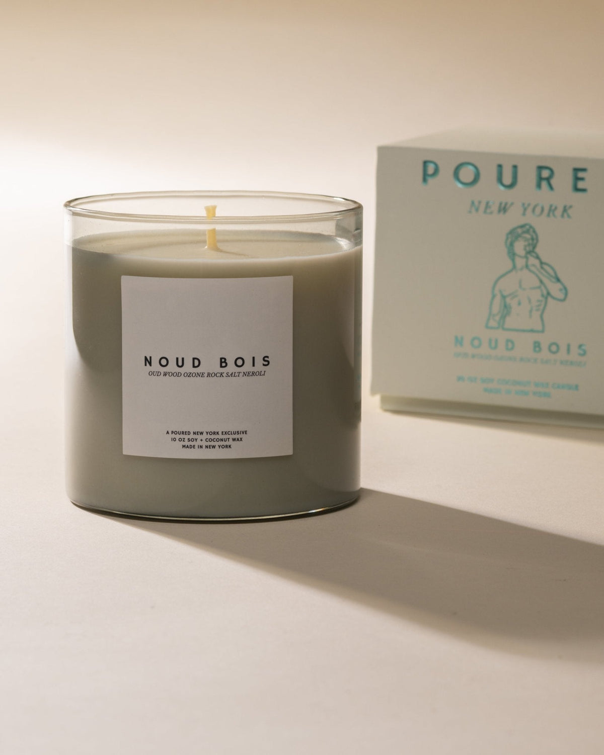Noud Bois candle with its printed box