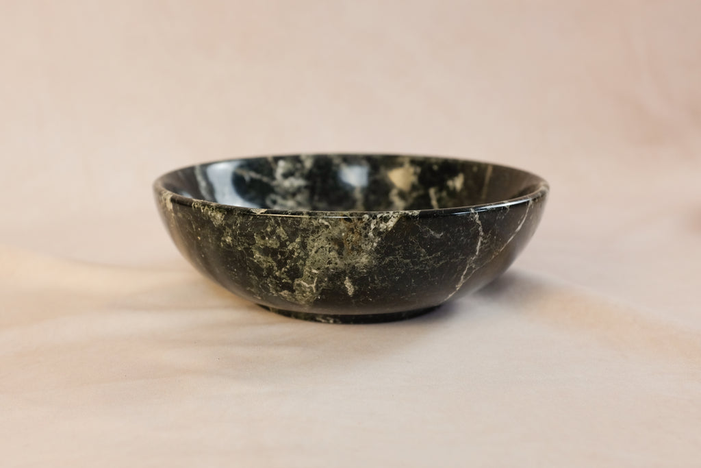 Black zebra marble bowl, cream veining