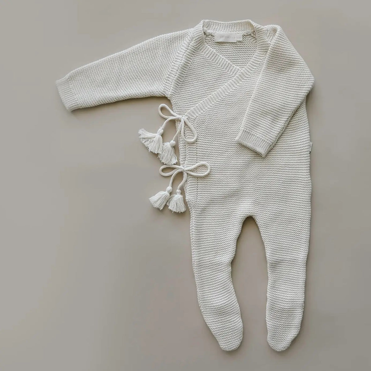 The Keepsake, August River Co. knit footed jumpsuit in natural