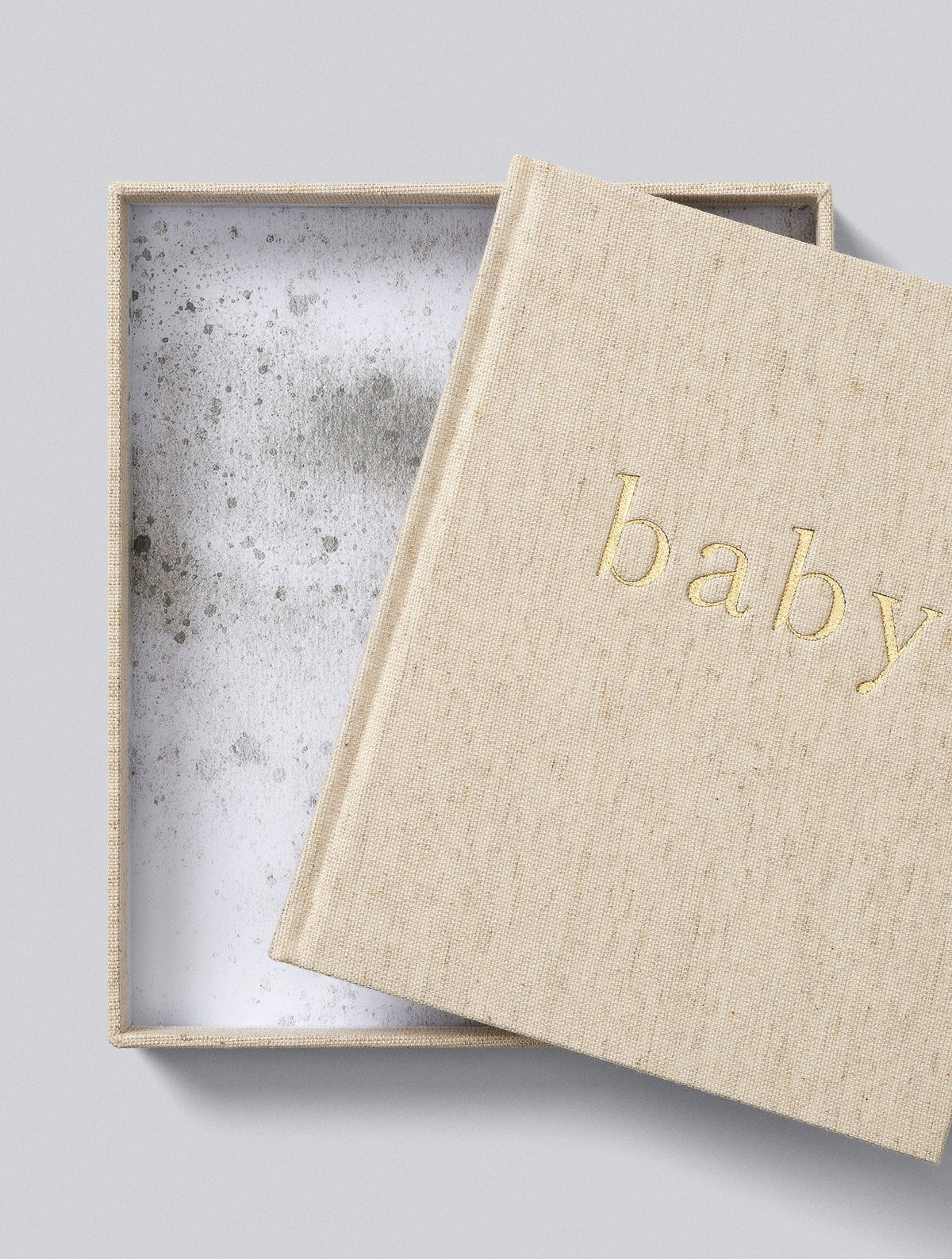 Oatmeal linen baby book in its matching linen keepsake box