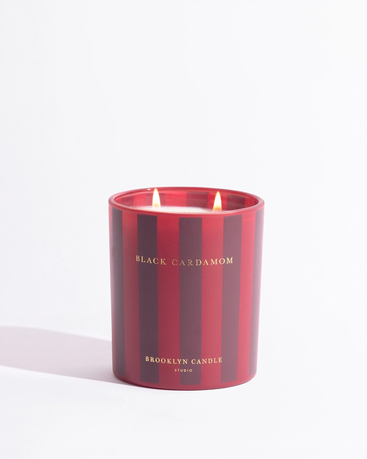 Black Cardamom candle, lit