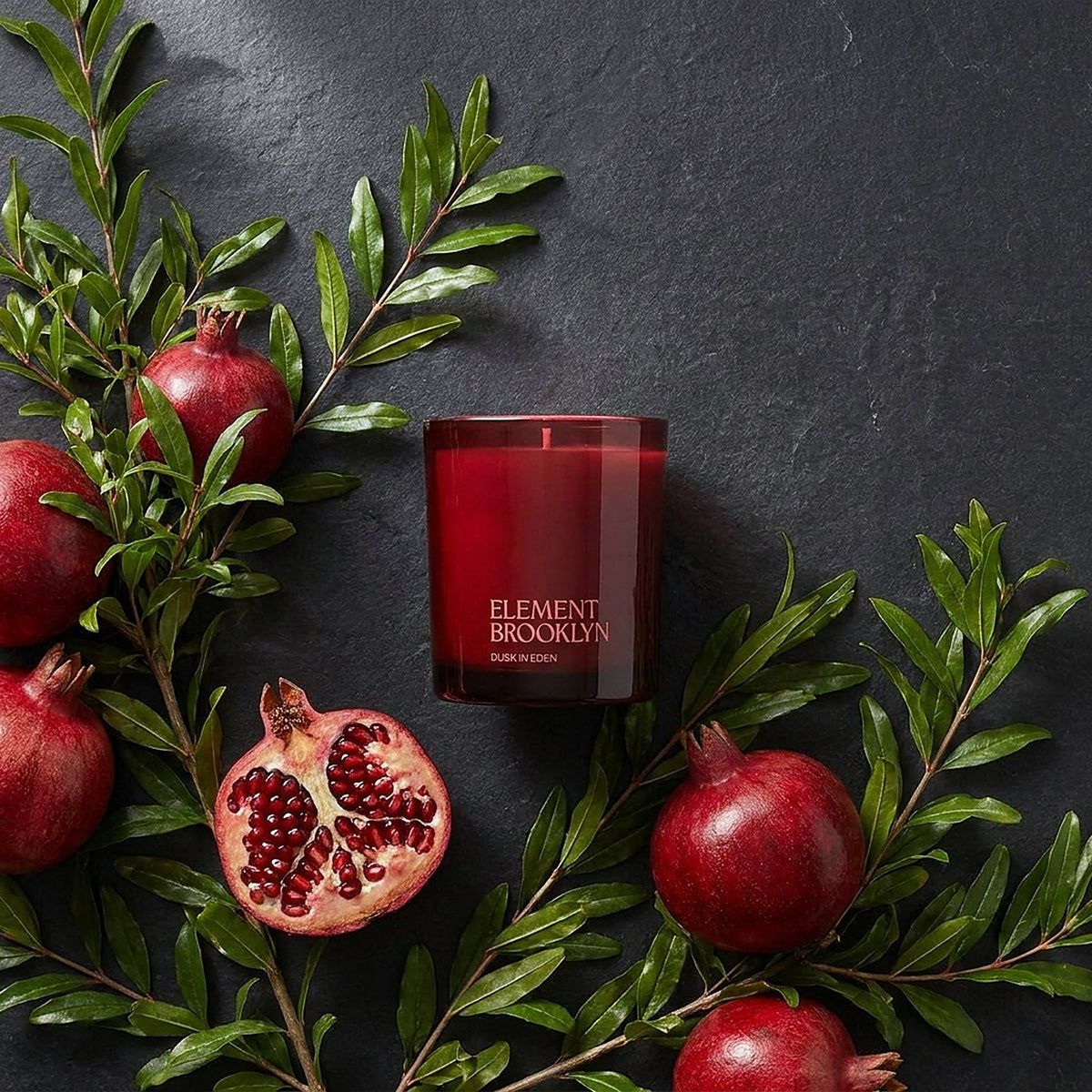 Dusk in Eden Candle with pomegranates, for the top note
