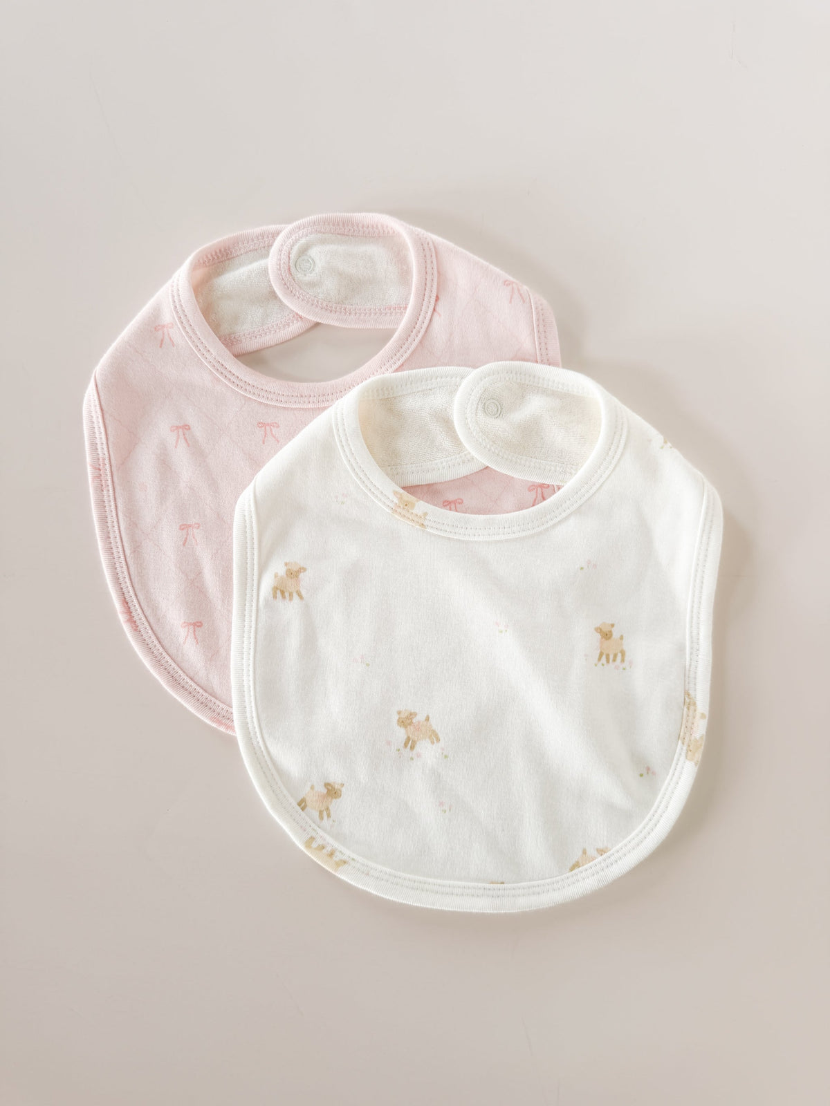 Lamb and Bow layette, bibs