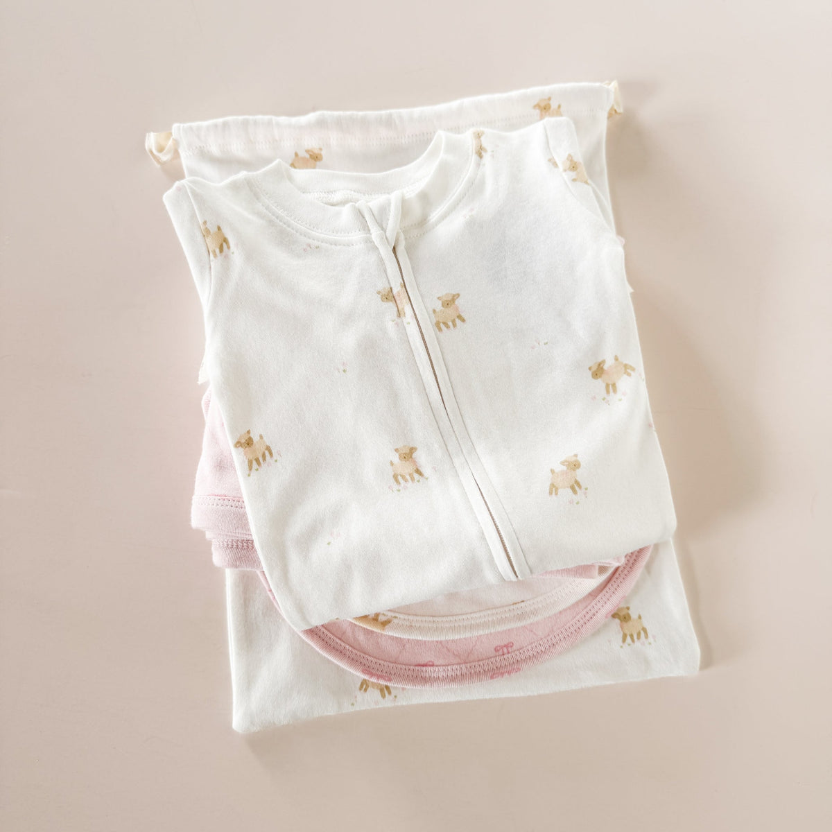 Lamb and Bow layette, romper