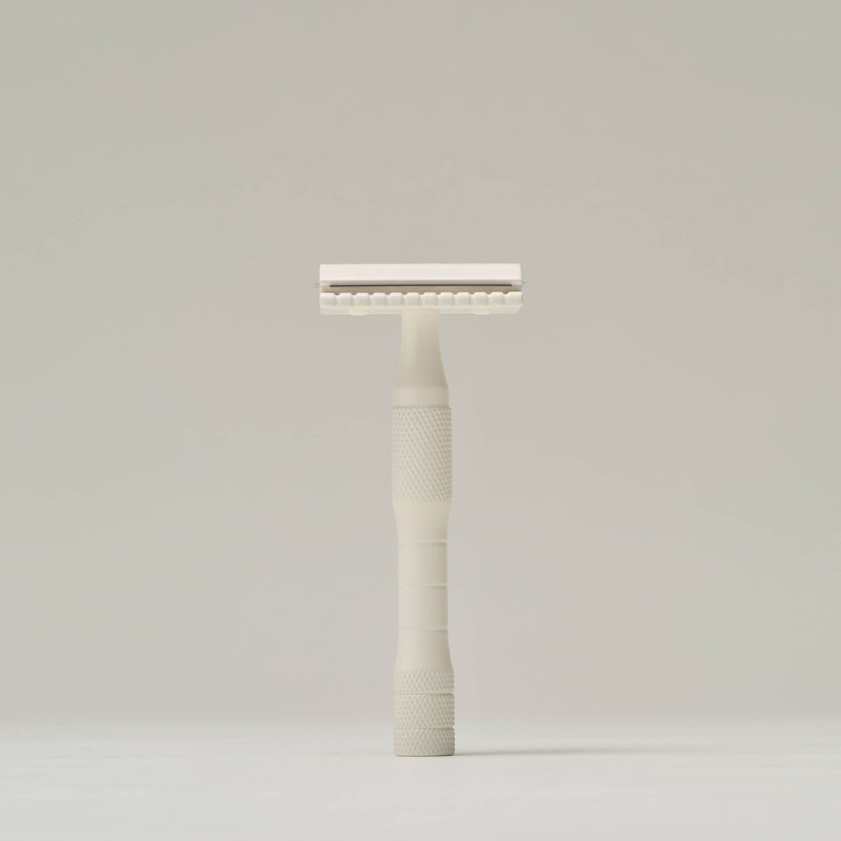Well Kept Brass Safety Razor in cream, detail