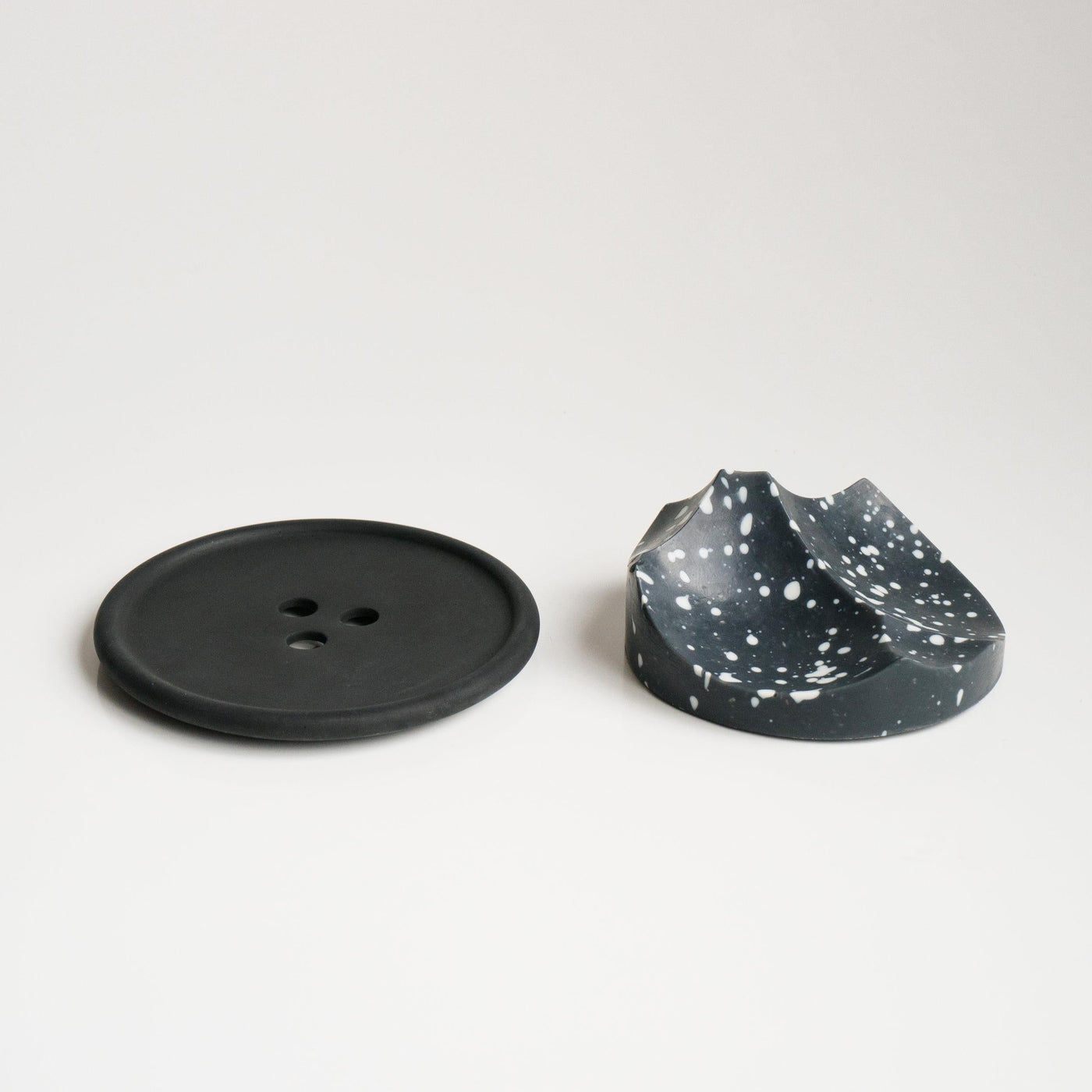 Erode Soap in Daily Detox, the black bar on its dish