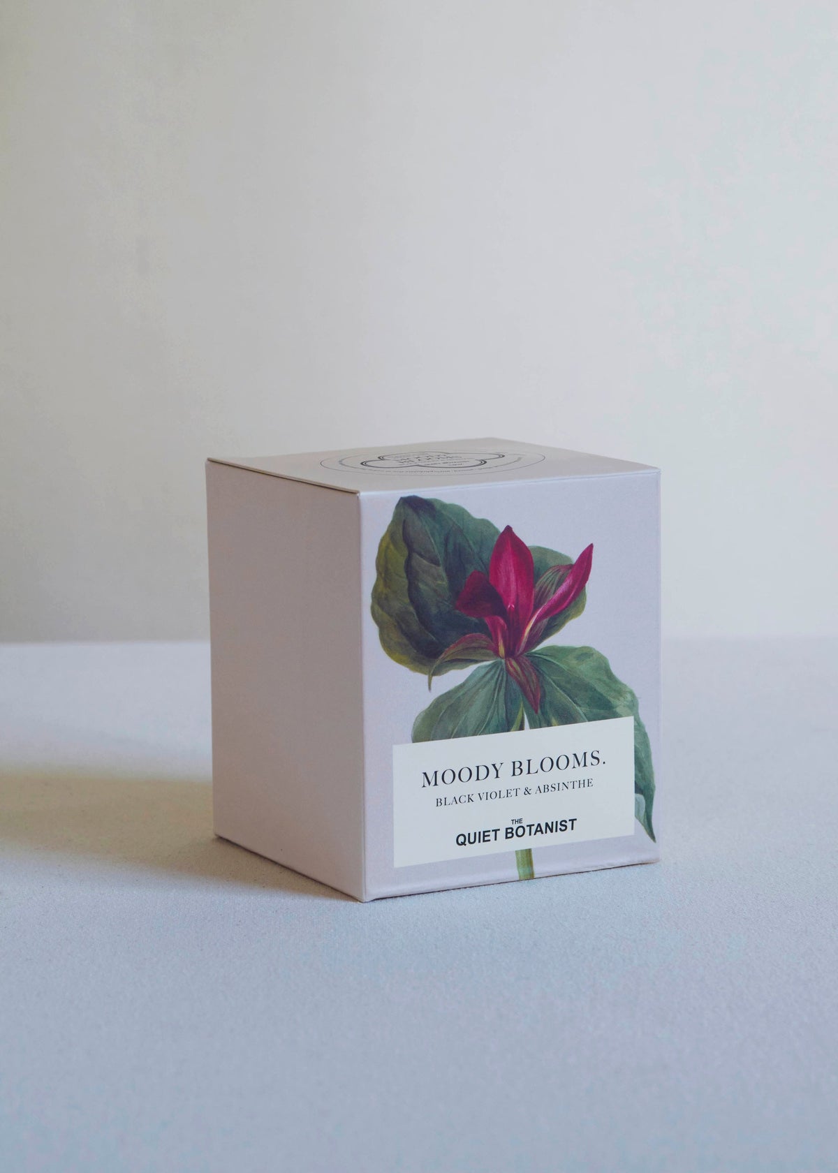 The Quiet Botanist Moody Blooms candle with its botanical box