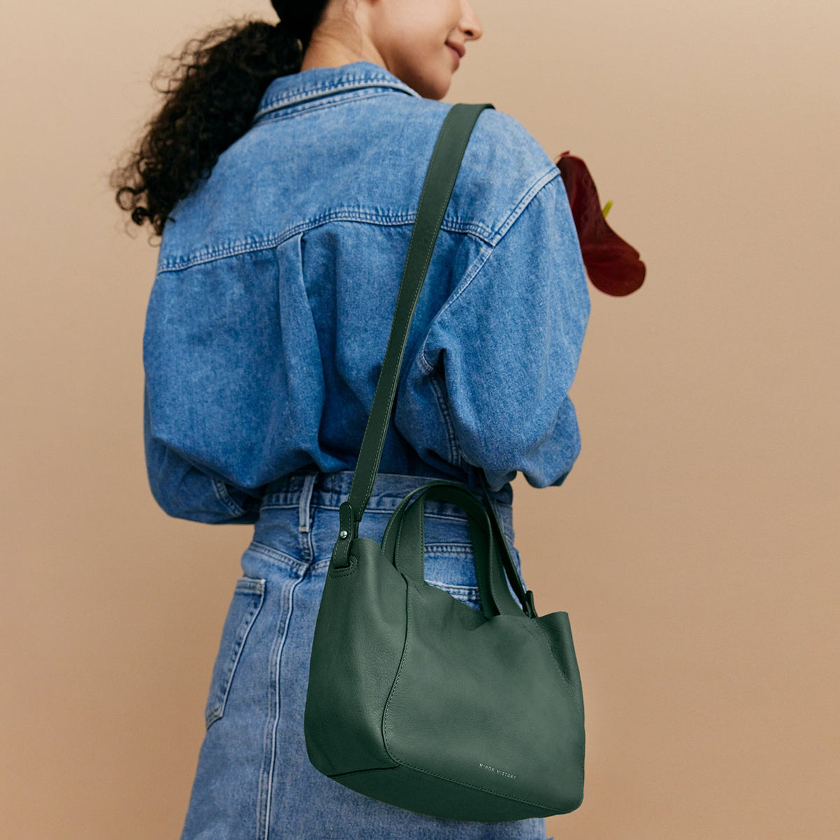 Minor History Little Times Tote in evergreen, worn crossbody