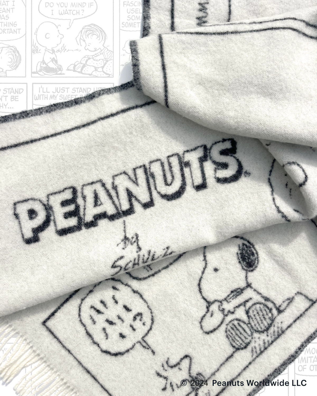 Peanuts wool blanket, fringed edge and comic detail