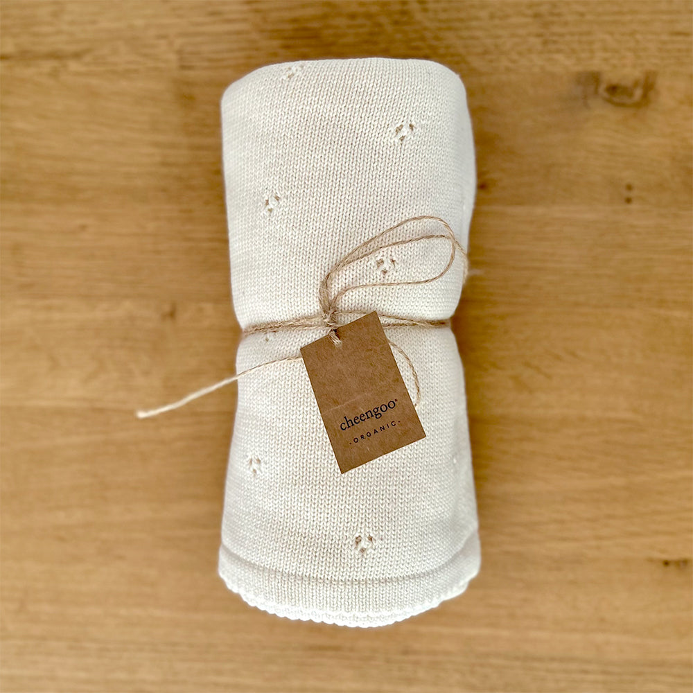 Cloverleaf Eyelet Knit Blanket in Cream