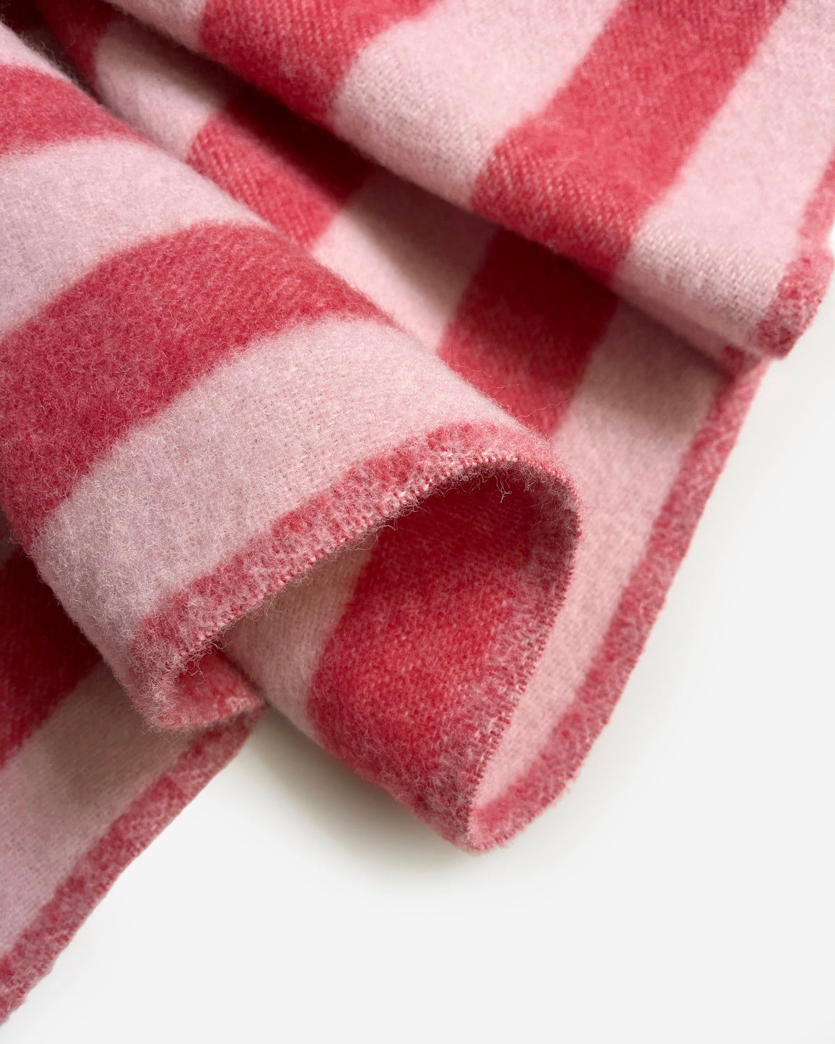 Candy Wrap Blanket in Pink and Cherry, folded