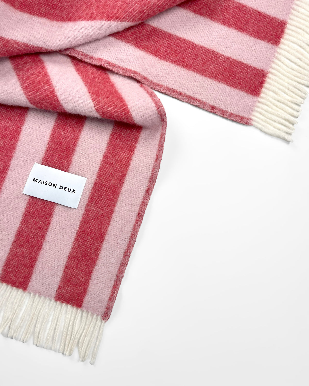 Candy Wrap Blanket in Pink and Cherry, detail of the fringe
