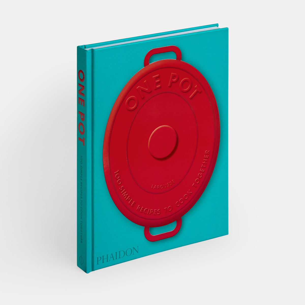 One Pot by Phaidon, standing, with its red Dutch oven lid on a teal cover